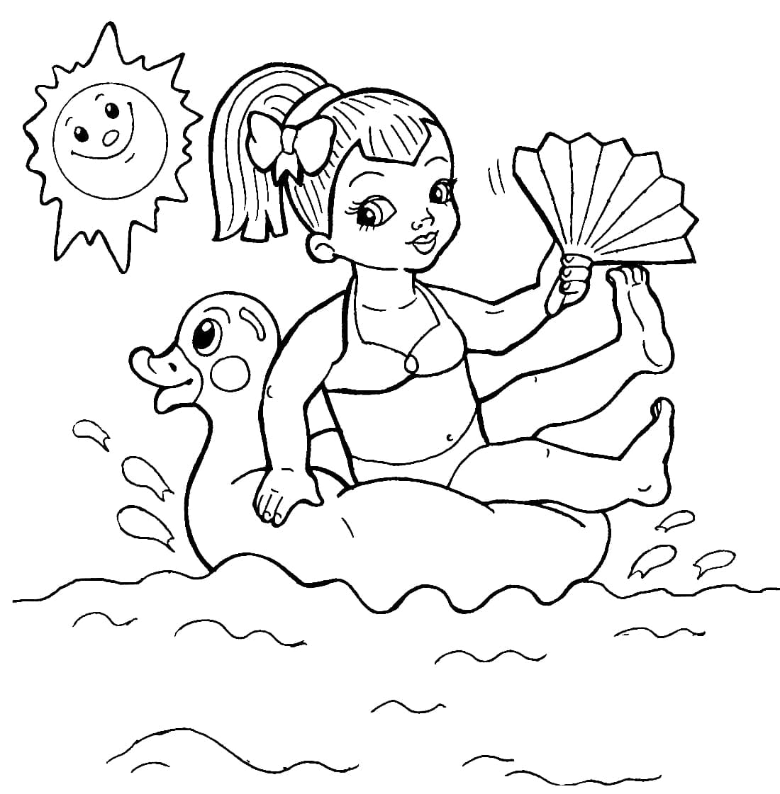 Девочка плывет на надувной утке